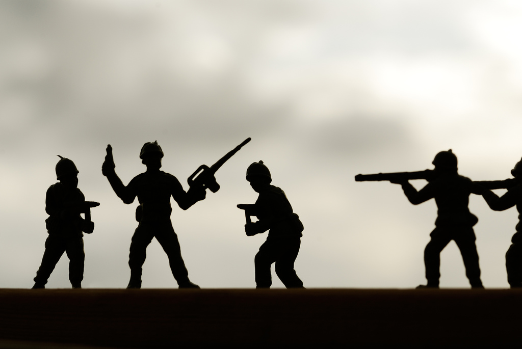 Toy soldiers in shadow