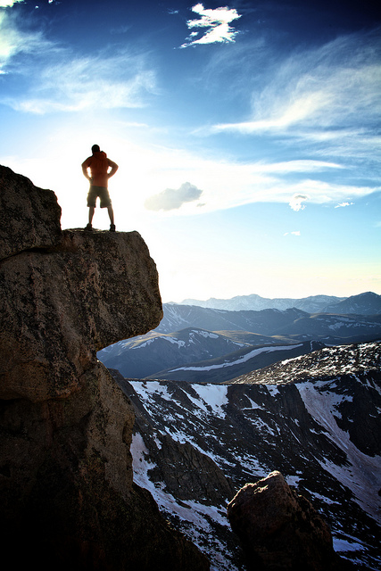 Hiker overlooking a Rocky Mountain vista 